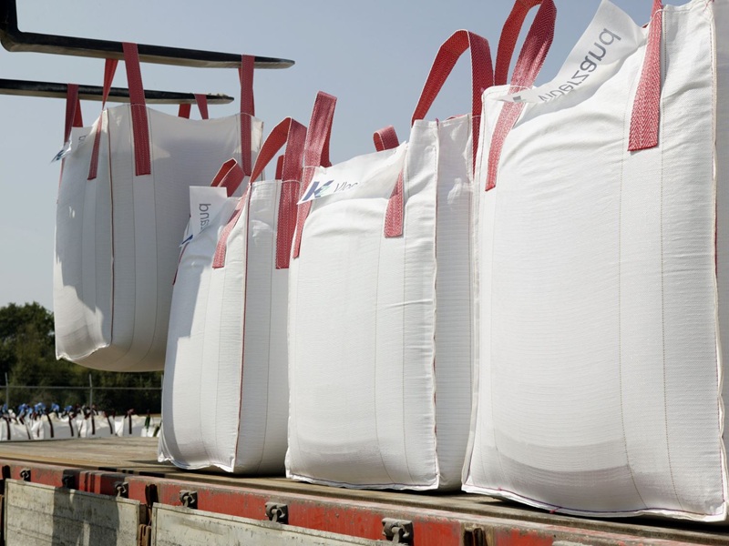 1-ton FIBC jumbo bags on pallets. forklift-compatible and ready for container loading